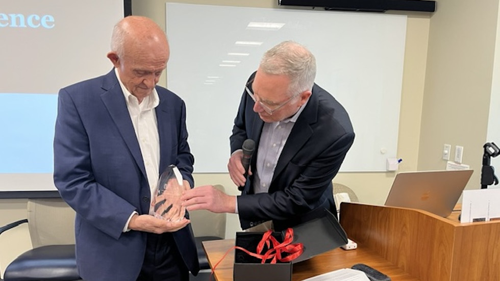 Joe Hogan and Constantine Gatsonis, holding award of recognition
